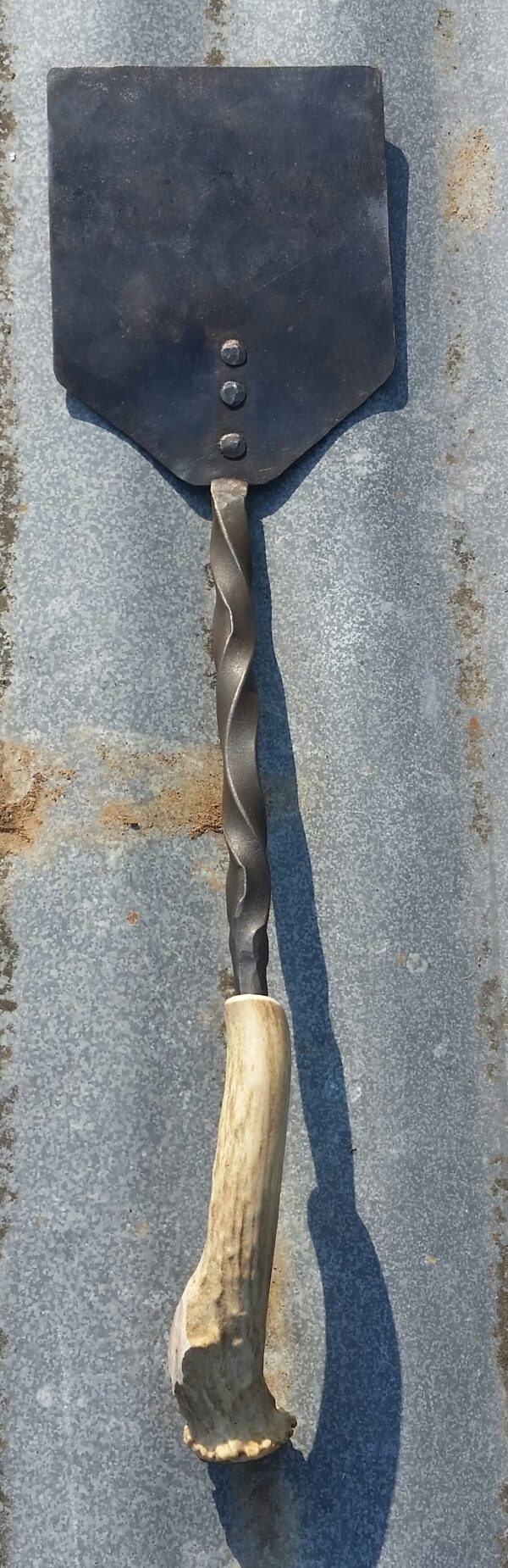 Handmade steel BBQ spatula with antler handle and twist design