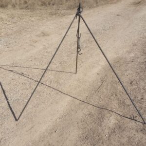 Handmade steel campfire tripod with S hooks for holding pots over an open fire