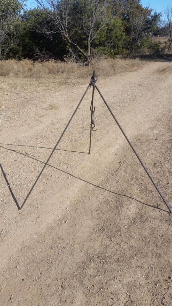Handmade steel campfire tripod with S hooks for holding pots over an open fire